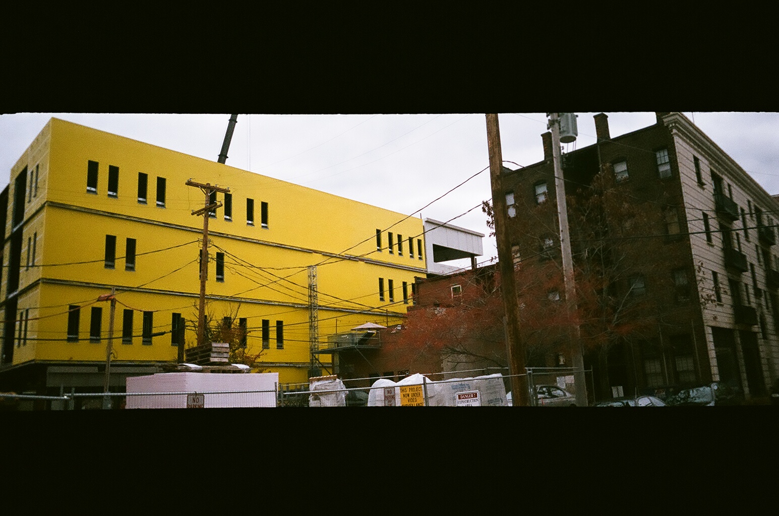 Big yellow building next to Euclid Tavern